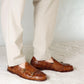 Brown moccasin with double golden buckle for men in woven leather
